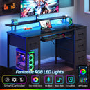 Seventable Computer Desk 47.2" with LED Lights & Power Outlets, Home Office Desk with 4 Drawers, Writing Desk with Keyboard Tray, Study Table with Monitor Stand, Work Desks for Home Office, Black